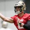 Saints rookie quarterback Tyler Shough throws a pass at rookie minicamp ahead of OTAs