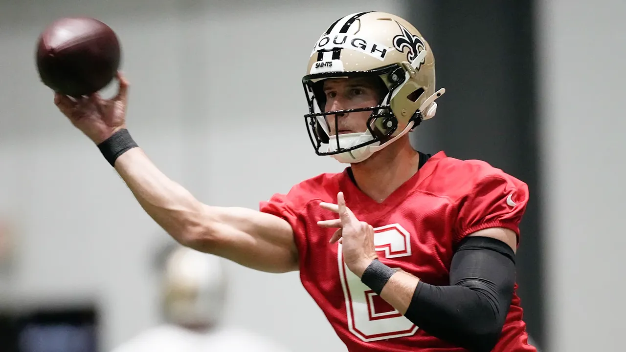 Saints rookie quarterback Tyler Shough throws a pass at rookie minicamp ahead of OTAs