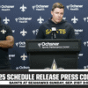 Kellen Moore introduces new "Angry Coach"-Rob Kazi to the media