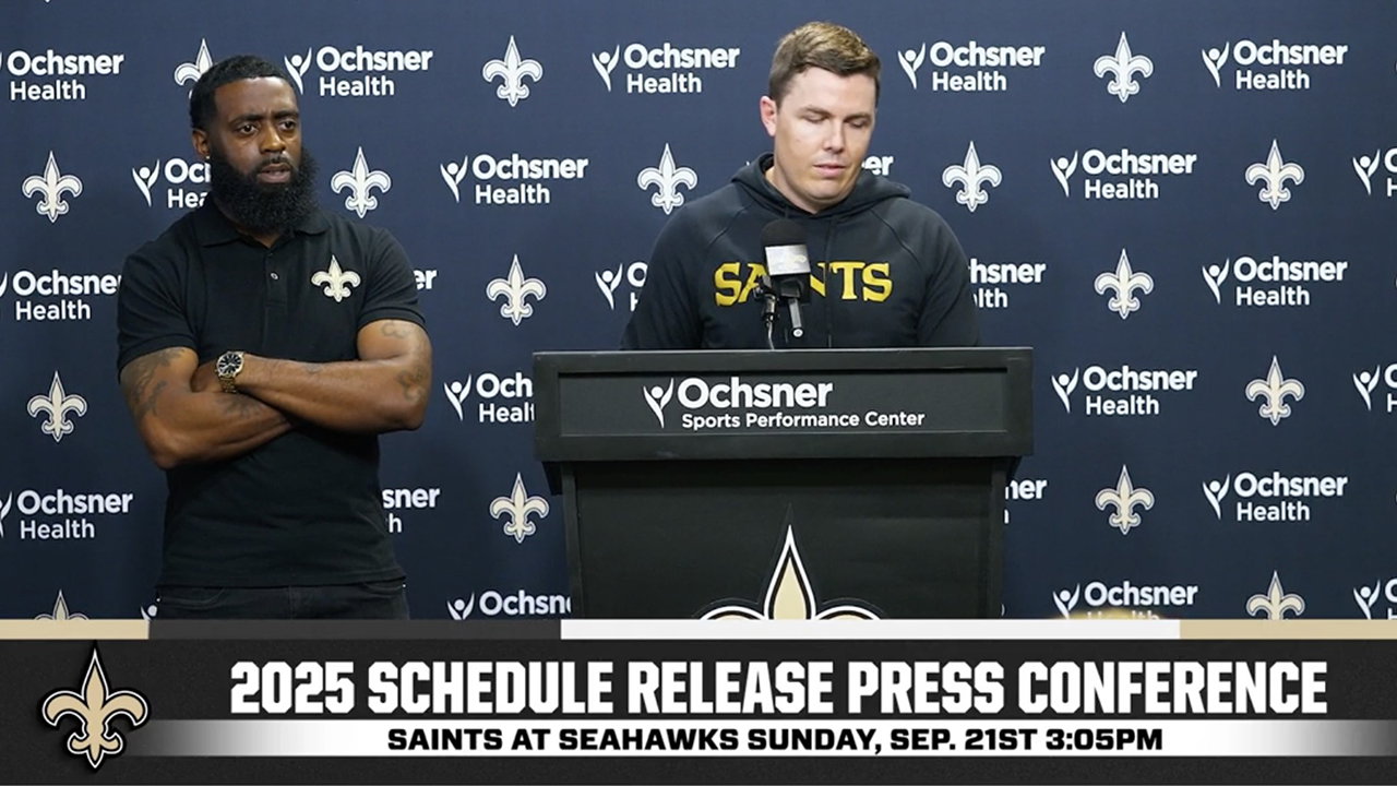 Kellen Moore introduces new "Angry Coach"-Rob Kazi to the media
