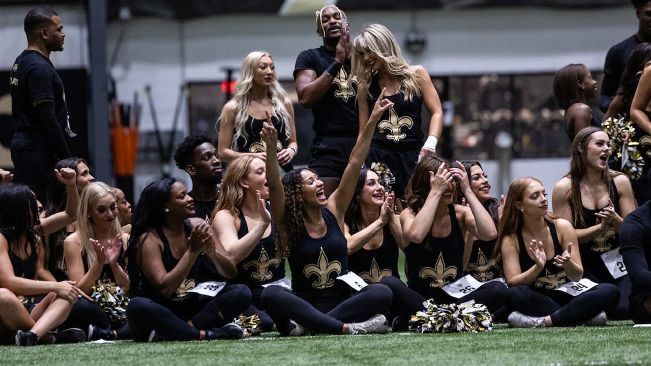 New Orleans Saints cheerleaders at final tryouts showcase their skills for the upcoming season.